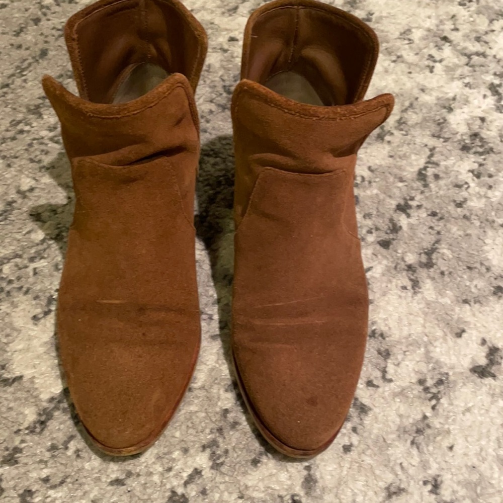 Moderately worn Michael Kors tan ankle boots w gold buckle accent